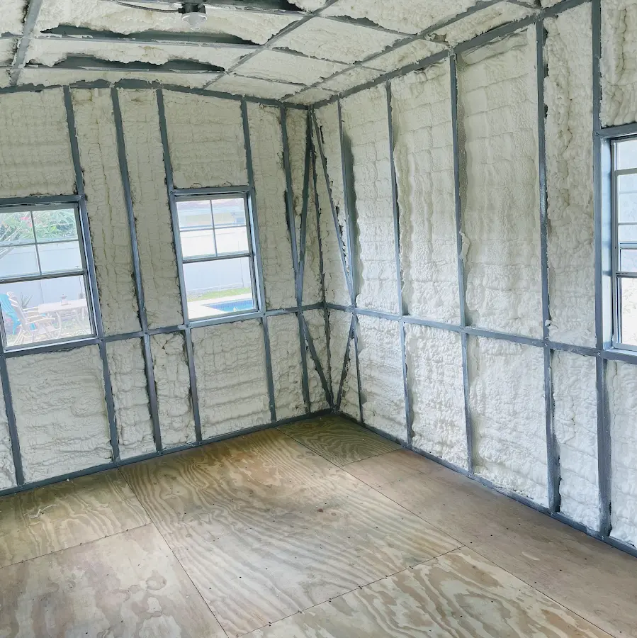 Closed-cell spray foam insulation applied to wall cavities in a residential project in Deerfield